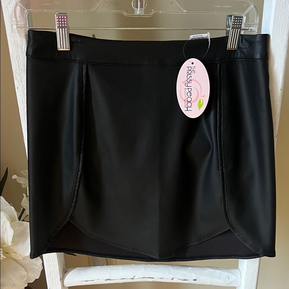 NWT Black Faux Leather Mini Skirt.  Size Four.